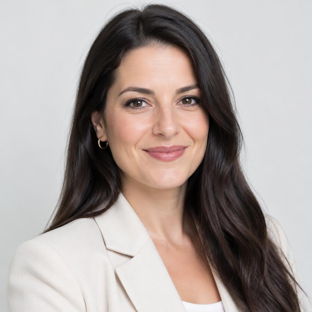 Portrait of a smiling woman with long dark hair